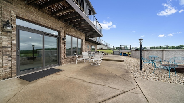 2765 W Pines Rd, Oregon, IL 61061 - view of patio featuring outdoor dining space