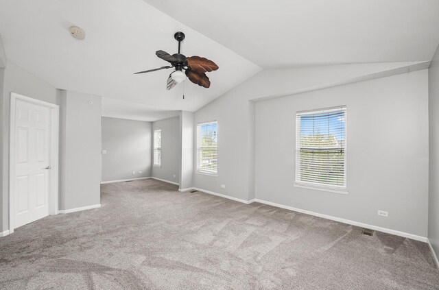 2045 Bonita Ln, Hoffman Estates, IL 60192 - empty room with a ceiling fan, carpet floors, vaulted ceiling, a smoke detector, and baseboards