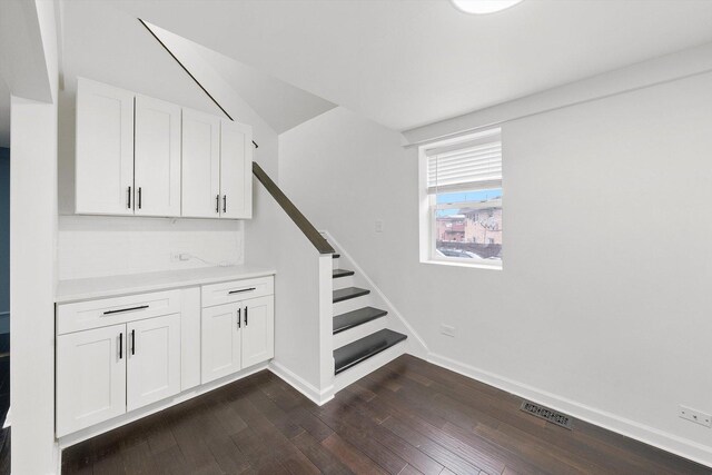 4322 Amelia Ave, Lyons, IL 60534 - stairs featuring wood finished floors, baseboards, and vaulted ceiling