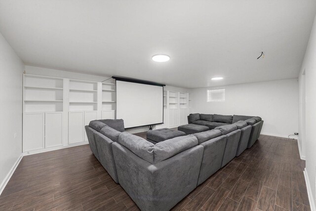 4322 Amelia Ave, Lyons, IL 60534 - home theater featuring baseboards, dark wood-style floors, and built in shelves