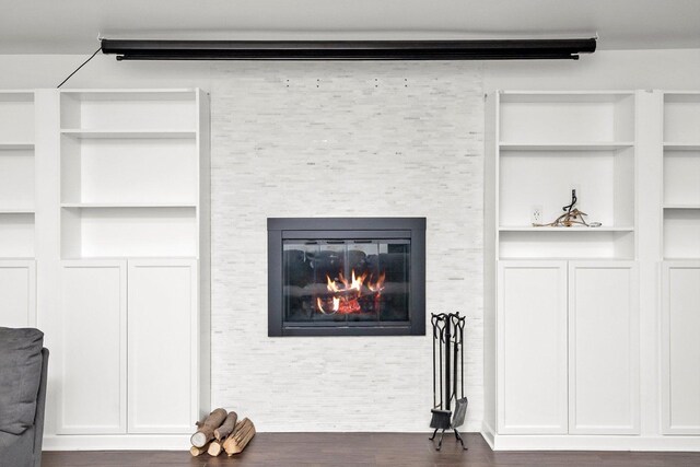 4322 Amelia Ave, Lyons, IL 60534 - detailed view of built in features, wood finished floors, and a glass covered fireplace