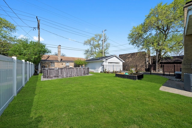 4322 Amelia Ave, Lyons, IL 60534 - view of yard with a vegetable garden and central AC unit
