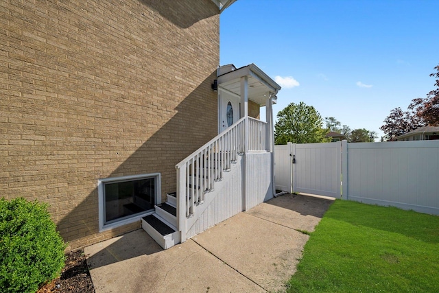 4322 Amelia Ave, Lyons, IL 60534 - property entrance with a gate and brick siding