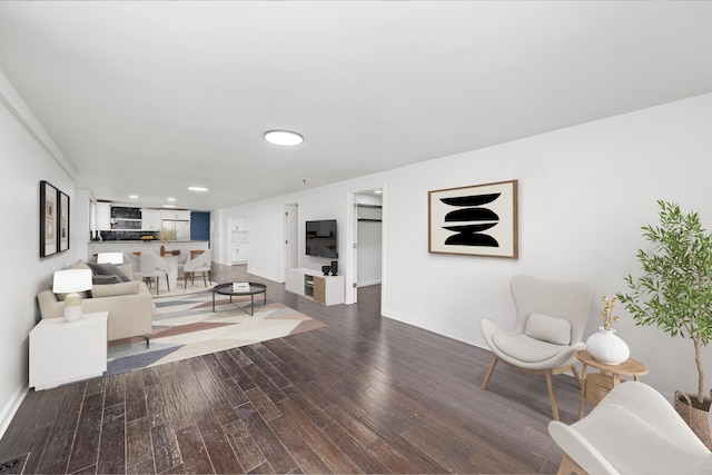 4322 Amelia Ave, Lyons, IL 60534 - living area featuring baseboards, dark wood-type flooring, and recessed lighting