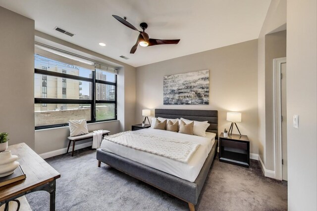 101 W Superior St Unit 501, Chicago, IL 60654 - carpeted bedroom featuring baseboards and a ceiling fan