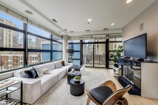 101 W Superior St Unit 501, Chicago, IL 60654 - living room with wood finished floors and recessed lighting