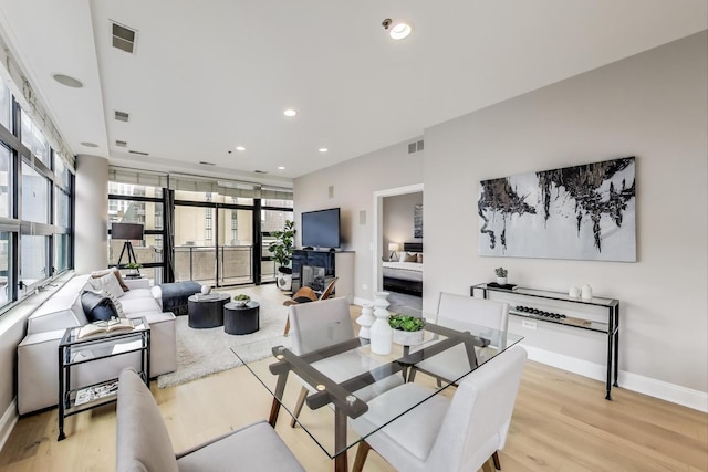 101 W Superior St Unit 501, Chicago, IL 60654 - dining room with light wood-type flooring, recessed lighting, and baseboards