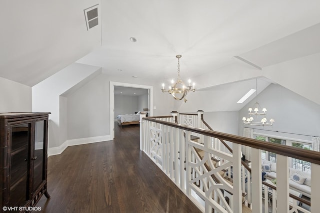 6 Tartan Ridge Rd, Burr Ridge, IL 60527 - hall with a chandelier, an upstairs landing, wood finished floors, vaulted ceiling, and baseboards