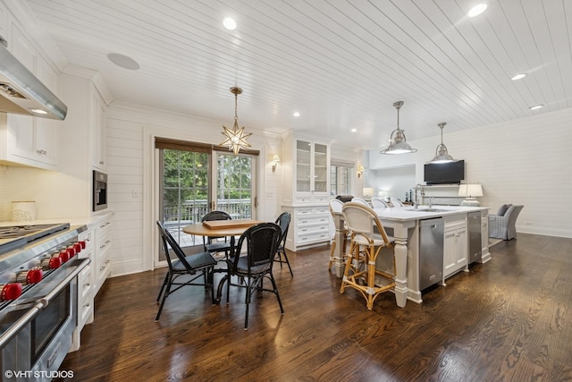 6 Tartan Ridge Rd, Burr Ridge, IL 60527 - kitchen featuring appliances with stainless steel finishes, wall chimney range hood, white cabinets, an island with sink, and recessed lighting