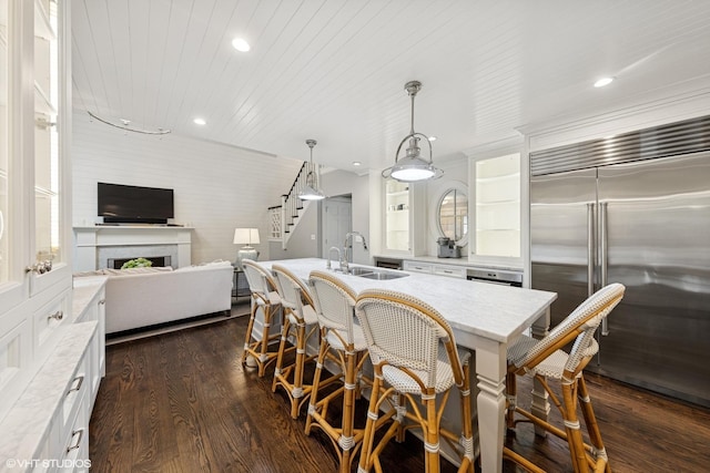 6 Tartan Ridge Rd, Burr Ridge, IL 60527 - kitchen featuring built in fridge, a sink, a kitchen breakfast bar, white cabinetry, and recessed lighting
