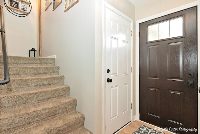 155 Shadowbrook Dr, Capron, IL 61012 - foyer featuring stairs and light wood-style floors