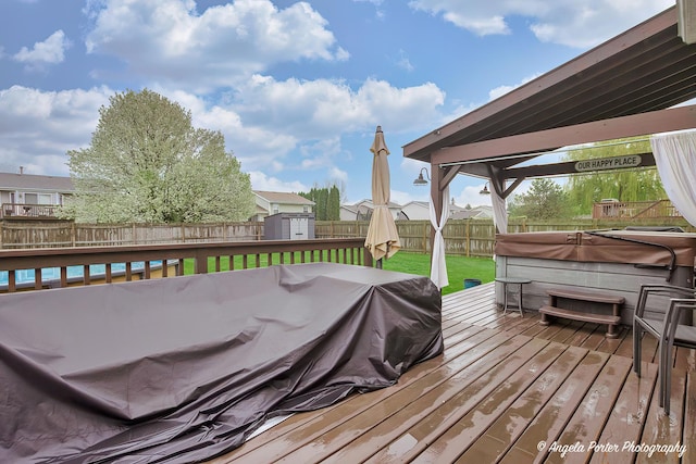 155 Shadowbrook Dr, Capron, IL 61012 - deck featuring a hot tub and outdoor dining area