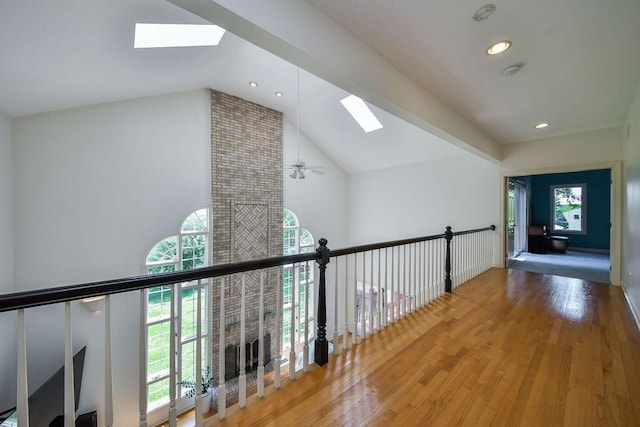 5N311 Lloyd Ave, Itasca, IL 60143 - corridor featuring a skylight, high vaulted ceiling, wood finished floors, and recessed lighting