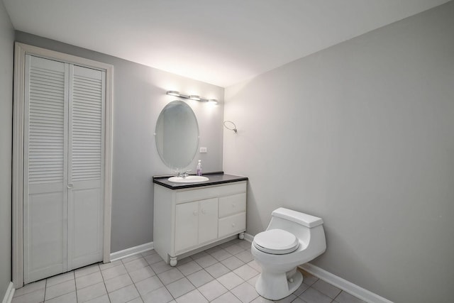 5N311 Lloyd Ave, Itasca, IL 60143 - bathroom featuring a closet, vanity, and tile patterned flooring