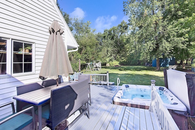 10726 W Liberty Ave, Beach Park, IL 60099 - wooden deck with a hot tub, a lawn, outdoor dining area, a playground, and view of wooded area