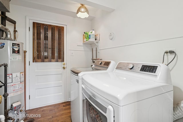 567 Byrd Rd, Riverside, IL 60546 - laundry area featuring water heater, independent washer and dryer, and wood finished floors