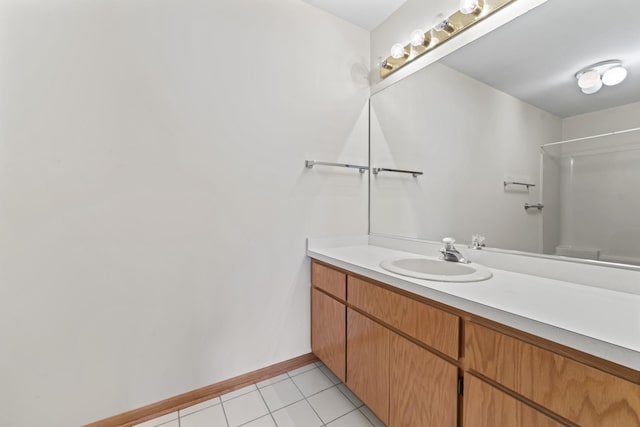 11234 Lakefield Dr, Orland Park, IL 60467 - full bathroom featuring vanity, tile patterned floors, and baseboards