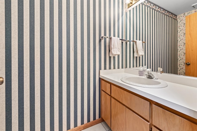 11234 Lakefield Dr, Orland Park, IL 60467 - bathroom with wallpapered walls, vanity, and tile patterned flooring