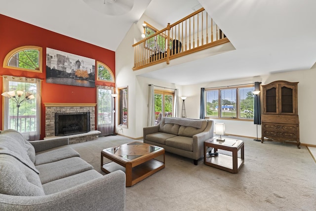 11234 Lakefield Dr, Orland Park, IL 60467 - living room with carpet, a high ceiling, baseboards, a fireplace, and a ceiling fan