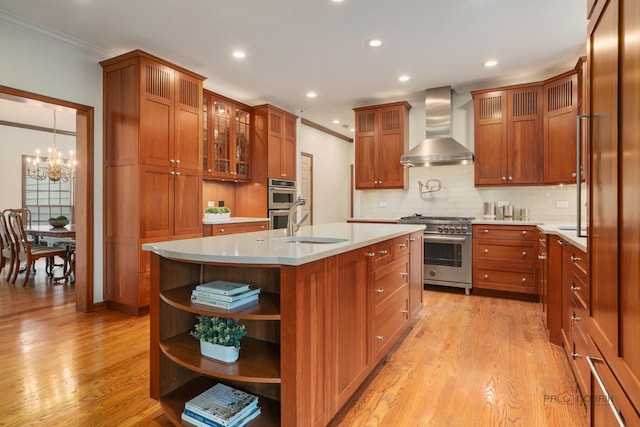 1602 Wickham Ct, Libertyville, IL 60048 - kitchen featuring stainless steel appliances, wall chimney range hood, ornamental molding, a chandelier, and light countertops