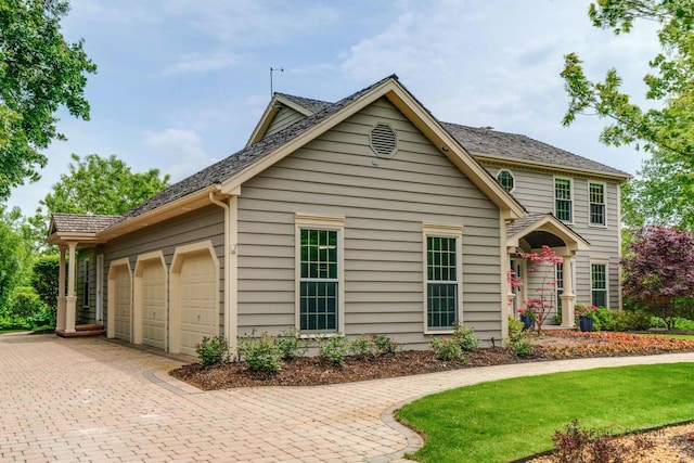 1602 Wickham Ct, Libertyville, IL 60048 - view of front of property with an attached garage and decorative driveway
