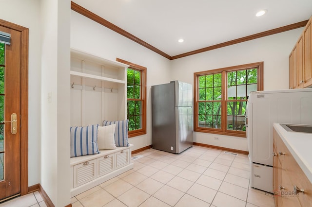 1602 Wickham Ct, Libertyville, IL 60048 - kitchen with freestanding refrigerator, ornamental molding, light countertops, recessed lighting, and light tile patterned floors