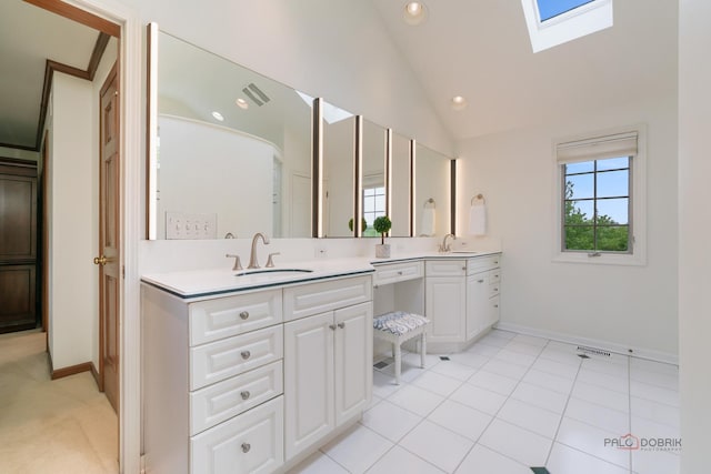 1602 Wickham Ct, Libertyville, IL 60048 - bathroom with a skylight, vanity, vaulted ceiling, and recessed lighting