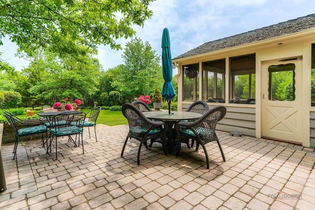 1602 Wickham Ct, Libertyville, IL 60048 - view of patio / terrace with outdoor dining space and a sunroom