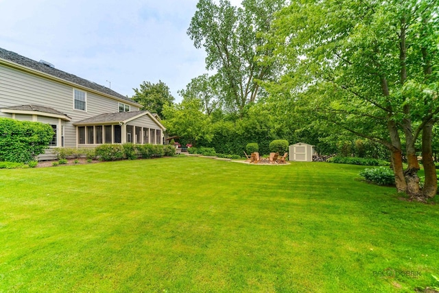 1602 Wickham Ct, Libertyville, IL 60048 - view of green lawn with a storage shed and a sunroom
