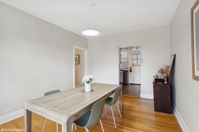 5842 N Wayne Ave Unit 1, Chicago, IL 60660 - dining space with light wood-type flooring and baseboards