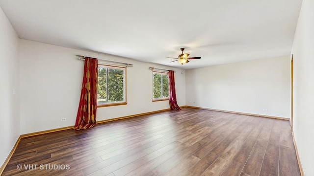 6542 Pine Hollow Rd, Carpentersville, IL 60110 - empty room featuring ceiling fan and dark wood finished floors