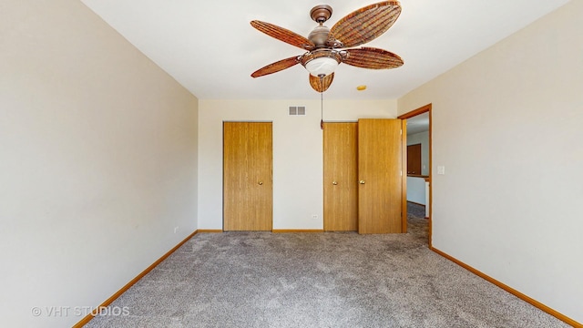 6542 Pine Hollow Rd, Carpentersville, IL 60110 - unfurnished bedroom featuring carpet flooring and a ceiling fan