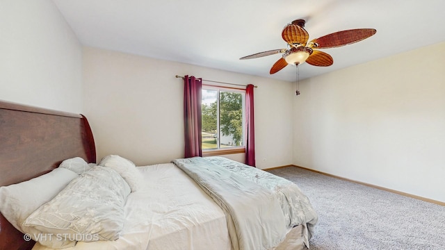 6542 Pine Hollow Rd, Carpentersville, IL 60110 - carpeted bedroom featuring baseboards and ceiling fan
