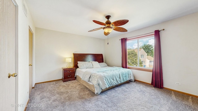 6542 Pine Hollow Rd, Carpentersville, IL 60110 - carpeted bedroom with baseboards and a ceiling fan