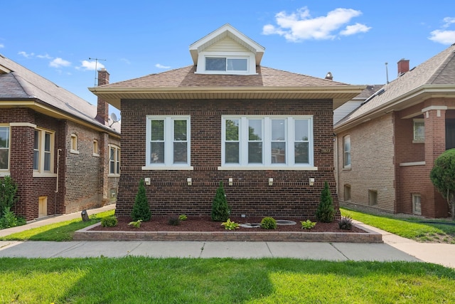 7827 S Calumet Ave, Chicago, IL 60619 - bungalow-style home featuring brick siding and roof with shingles