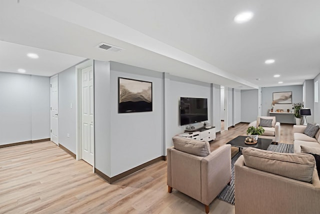 7827 S Calumet Ave, Chicago, IL 60619 - living area with light wood finished floors, baseboards, and recessed lighting