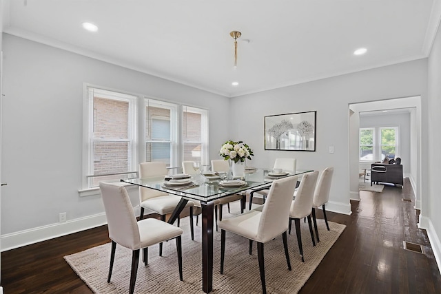 7827 S Calumet Ave, Chicago, IL 60619 - dining room featuring dark wood-style floors, baseboards, crown molding, and recessed lighting