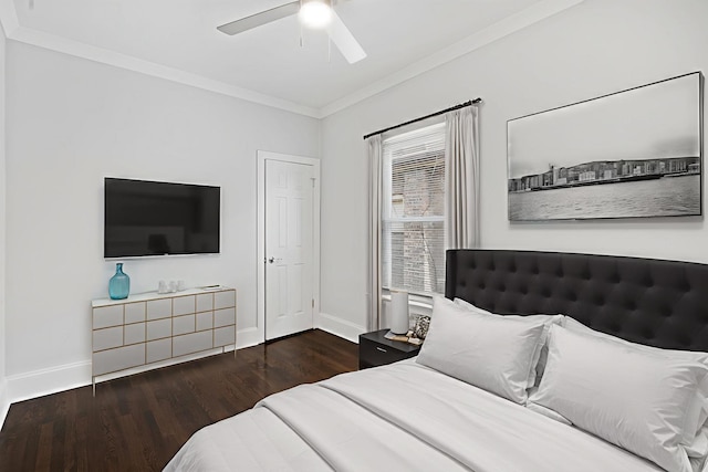 7827 S Calumet Ave, Chicago, IL 60619 - bedroom featuring ornamental molding, baseboards, wood finished floors, and ceiling fan
