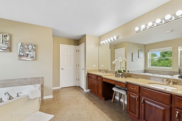 18861 W Aspen Ct, Lake Villa, IL 60046 - bathroom with double vanity, a garden tub, and tile patterned flooring