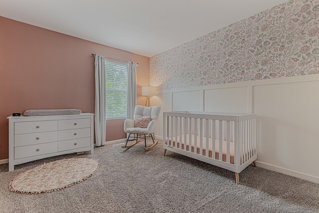 2367 Camden Bay, Elgin, IL 60123 - bedroom featuring wallpapered walls, a wainscoted wall, a nursery area, a decorative wall, and carpet flooring