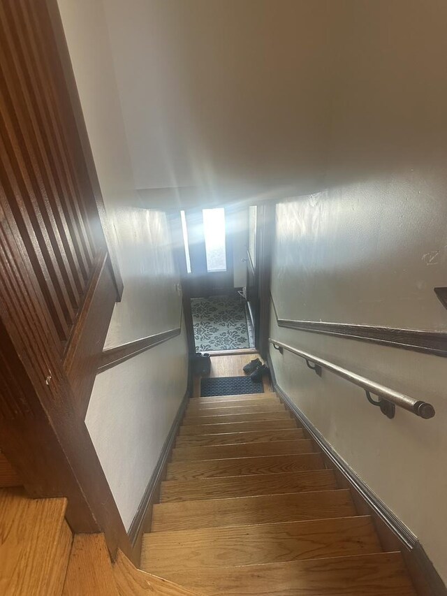 7127 S Eberhart Ave, Chicago, IL 60619 - stairway with wood finished floors and baseboards