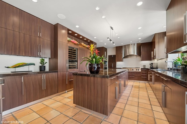 1242 Antietam Dr, Long Grove, IL 60047 - kitchen with wall chimney exhaust hood, modern cabinets, a center island, recessed lighting, and beverage cooler