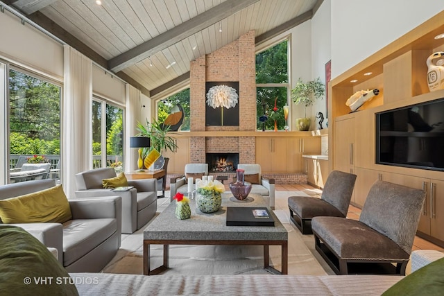 1242 Antietam Dr, Long Grove, IL 60047 - living area featuring high vaulted ceiling, healthy amount of natural light, a wood ceiling with exposed beams, and a fireplace