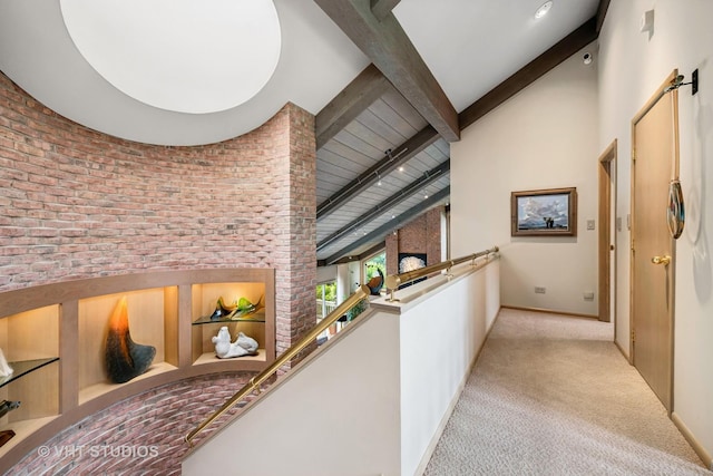 1242 Antietam Dr, Long Grove, IL 60047 - hallway with beam ceiling, brick wall, high vaulted ceiling, and light colored carpet