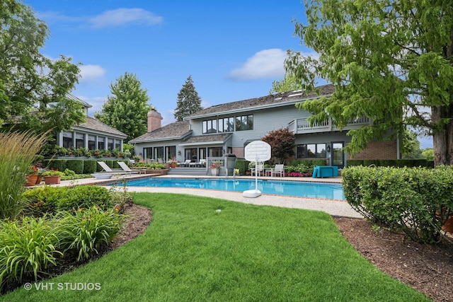1242 Antietam Dr, Long Grove, IL 60047 - rear view of house featuring brick siding, an outdoor pool, and a yard