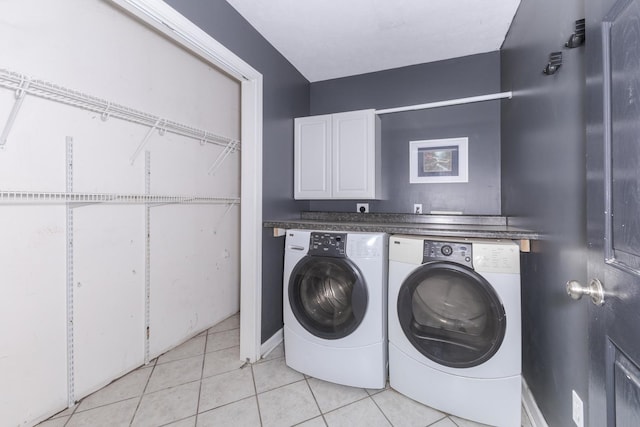102 Merganser Ct, Downs, IL 61736 - laundry room with independent washer and dryer, light tile patterned floors, and cabinet space