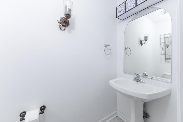 102 Merganser Ct, Downs, IL 61736 - bathroom featuring baseboards