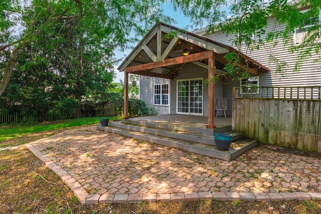 102 Merganser Ct, Downs, IL 61736 - wooden terrace with a patio