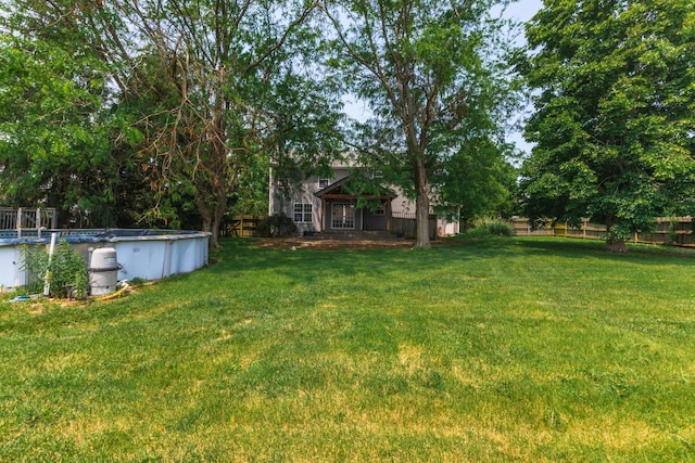 102 Merganser Ct, Downs, IL 61736 - view of yard with an outdoor pool
