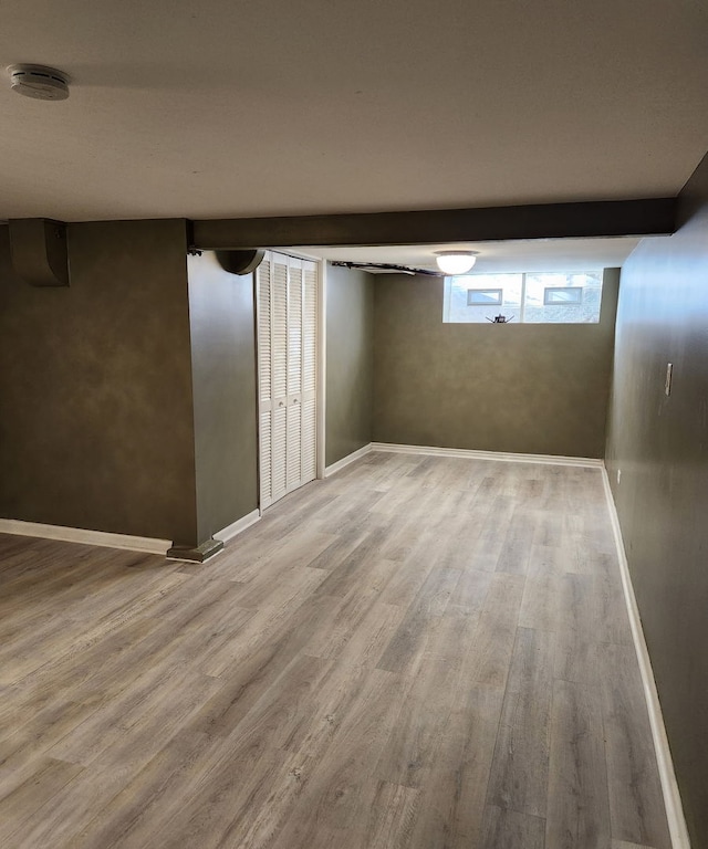 basement featuring wood finished floors